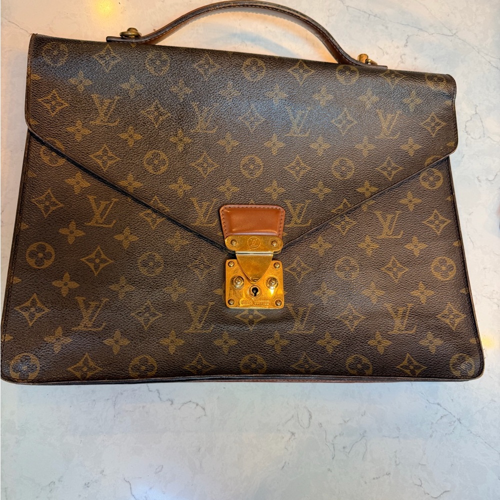 Vintage Louis Vuitton serviette conseiller